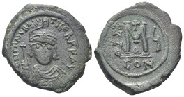 Maurice Tiberius Æ Nummus. (26mm, 11.85 g) Constantinople, dated RY 5 =AD 586/7. ∂ N M TIbЄR P P(sic), helmeted and cuirassed bust facing, holding glo...