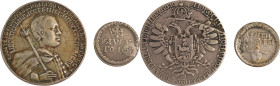 13. Lot de deux reproductions comprenant le rouble
de Dimitri Yanovitch et la médaille concernant
l'impôt sur les barbes de 1705.
TB.