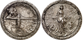 1925. Alfonso XIII. Conmemoración de la inauguración del Ferrocarril Santander Mediterráneo. Marca en canto: PLATA 800. Gruesa láurea encintada como g...