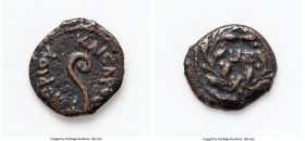 JUDAEA. Roman Procurators. Pontius Pilate (AD 26-36). AE prutah (16mm, 2h). VF, bronze disease. Jerusalem, dated Regnal Year 17, under Tiberius (AD 30...
