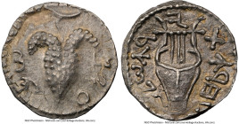 JUDAEA. Bar Kokhba Revolt (AD 132-135). AR zuz (18mm, 3.01 gm, 7h). NGC AU 4/5 - 5/5, overstruck. Undated issue of Year 3 (AD 134/5). Simon (Paleo-Heb...