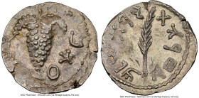 JUDAEA. Bar Kokhba Revolt (AD 132-135). AR zuz (18mm, 3.35 gm, 7h). NGC AU 3/5 - 4/5, overstruck. Undated issue of Year 3 (AD 134/5). Simon (Paleo-Heb...