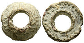 PREMONEDA. Anillo-rueda con agujero. (Pb. 7,75g/19mm). Siglo V-I a.C. (FAB-P.25-26 var). Decoración en ambas áreas. MBC+. Interesante y raro ejemplar....