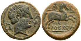 ARECORATAS (Agreda, Soria). As. (Ae. 9,35g/24mm). 150-20 a.C. (FAB-116). Anv: Cabeza masculina a derecha, entre dos delfines. Rev: Jinete con lanza a ...