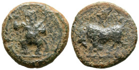 EBUSUS (Ibiza). 1/4 Calco. (Ae. 3,18g/16mm). 200-100 a.C. (FAB-923). Anv: Bes con faldellín de frente sosteniendo martillo y serpiente. Rev: Toro embi...