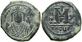 MAURICIO TIBERIO. Follis. (Ae. 11,70g/31mm). Año X (591-592 d.C.). Theoupolis (Antioquía). (Seaby 533). Anv: Busto de Mauricio Tiberio de frente con c...