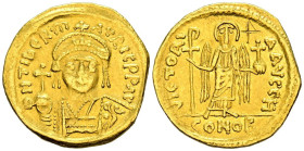 MAURICIO TIBERIO. Sólido. (Au. 4,33g/21mm). 583-601 d.C. Constantinopla. (Seaby 478). Anv: Busto drapeado y con coraza de Mauricio Tiberio de frente p...