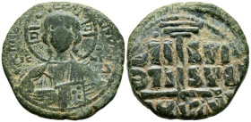 ANONIMO, Atribuído a Romano III. Follis. (Ae. 11,48g/27mm). 1028-1034 d.C. Constantinopla. (Seaby 1823). Anv: Busto de Cristo de frente con libro y cr...