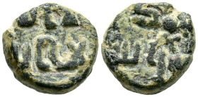 EMIRATO DEPENDIENTE DE CÓRDOBA, PERIODO DE GOBERNADORES. Anónimo. Felús. (Ae. 2,11g/15mm). S/D. (Frochoso II-c). Anv: لاالله/ لااله ا. Rev: سول الله /...