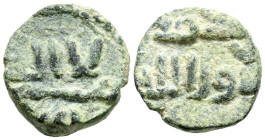 EMIRATO DEPENDIENTE DE CÓRDOBA, PERIODO DE GOBERNADORES. Anónimo. Felús. (Ae. 2,23g/14mm). S/D. (Frochoso II-e). Anv: لاالله/ لااله ا, adorno serpente...