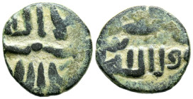 EMIRATO DEPENDIENTE DE CÓRDOBA, PERIODO DE GOBERNADORES. Anónimo. Felús. (Ae. 2,11g/15mm). S/D. (Frochoso II-e). Anv: لاالله/ لااله ا con adornos serp...