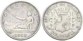GOBIERNO PROVISIONAL (1868-1871). 1 Peseta. (Ar. 4,90g/23mm). 1869 *18-69. Madrid SNM. (Cal-2019-17). Leyenda: ESPAÑA. MBC-/BC+. Rara.