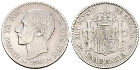 ALFONSO XII (1874-1885). 1 Peseta. (Ar. 4,93g/23mm). 1881 *18-81. Madrid MSM. (Cal-2019-17). MBC-/BC+. Primera estrella floja. Escasa.