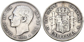 ALFONSO XII (1874-1885). 1 Peseta. (Ar. 4,81g /23mm). 1882/1 *18-81. Madrid MSM. (Cal-2019-18). Escasa. MBC-. Estrellas flojas pero visibles.