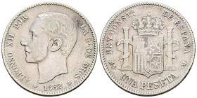 ALFONSO XII (1874-1885). 1 Peseta. (Ar. 4,97/23mm). 1882 *18-82. Madrid MSM. (Cal-2019-20). MBC-. Primera estrella algo más floja. Escasa.