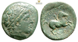 Kings of Macedon. Philip II AE Unit. Circa 359-336 BC. (4.70g, 17.9mm.) Miletos mint. Circa 323 BC Diademed head of Apollo right / FILIPPOU, rider on ...