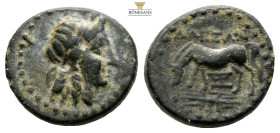Troas, Alexandria. AE 3rd-2nd century BC. (3.86g, 11.6mm.1.7h) Laureate head of Apollo to right / Horse grazing to left; ΑΛΕΞΑΝ above, monogram below,...