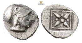 Troas, Kolone AR Hemiobol. Circa 4th century BC. (0.42g, 8.5mm 6h.)Helmeted head of Athena to right / Stellate pattern in linear square; all within in...