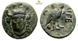 Troas, Sigeion. AE Circa. 355-334 BC. (2.19g, 13.2mm 12h.) Helmeted head of Athena facing slightly r. / Owl standing r., head facing; crescent behind....