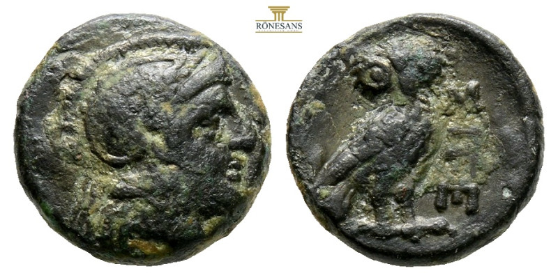 Troas, Sigeion. AE Circa. 350 BC.(2.05g, 12.4mm 9h.) Helmeted head of Athena r. ...