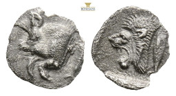 Mysia, Kyzikos AR Obol. Circa 450-400 BC. (0.27g, 9.1mm3h.) Forepart of boar to left, tunny fish behind / Head of roaring lion to left within incuse s...