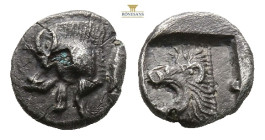 Mysia, Kyzikos AR Obol. Circa 450-400 BC. (0.41g, 7.6mm3h.) Forepart of boar to left, tunny fish behind / Head of roaring lion to left within incuse s...
