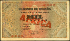 1000 Pesetas. 20 de Mayo de 1938. Serie A. (Edifil 2023: 434). Sobrecarga tipográfica AFRICA, en rojo. Extremadamente raro, con pequeñas roturitas en ...