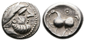 Celts in Eastern Europe, circa 3rd century BC. AR Tetradrachm (21.2 mm, 12.08 g.). „Kugelwange” Type. Celticised, bearded head wearing reversed laurel...