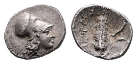 Lucania. Metapontion, circa 350-275 BC. AR Diobol (12 mm, 1.21 g.). Head of Athena right, wearing Corinthian helmet. Rev. META, Ear of barley; in righ...