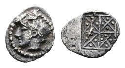 Macedon. Olynthos, circa 425-420 BC. AR Hemiobol (8.3 mm, 0.28 g.). Laureate head of Apollo to left. Rev. Geometric pattern of dotted triangles within...