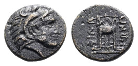 Macedon. Philippi, circa 356-345 BC. AE (11.4 mm, 1.23 g.). Head of Herakles to right, wearing lion’s skin headdress. Rev. ΦΙΛΙΠ-ΠΩΝ, tripod. HGC 3, 6...