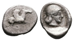 Corinthia. Corinth, circa 510-500 BC. AR Drachm (14.3 mm, 2.55 g.). Winged Pegasos to left; koppa symbol below. Rev. Female head right in incuse punch...