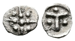 Uncertain mint, possibly Peloponnesos Tegea, 5th-4th century BC. AR Hemiobol (10.6 mm, 0.48 g.). Six pointed star with pellets on each arm. Rev. Large...