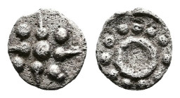 Uncertain mint, possibly Peloponnesos, 5th-4th century BC. AR Hemiobol (8.0 mm, 0.35 g.). Six pointed star with pellets on each arm. Rev. Large O surr...