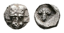 Thraco-Macedonian Region. Uncertain mint, circa 5th century BC. AR Hemiobol (8.0 mm, 0.24 g.). Lion’s head facing. Rev. Grape bunch within incuse squa...