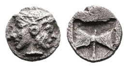 Islands off Troas. Tenedos, circa 550-470 BC. AR Obol (7.6 mm, 0.52 g.). Janiform head of Hera, on left, and Zeus, on right. Rev. Double axe within in...