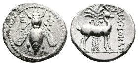 Ionia. Ephesos, circa 202-150 BC. AR Drachm (18.8 mm, 3.94 g.). Aichmokles, magistrate. E – Ф, bee. Rev. Stag standing right; palm tree in background,...