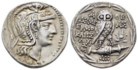 ATTICA. Athens.(Ca. 168/5-50 BC). AR tetradrachm .

Obv : Helmeted head of Athena right.
Rev : Owl standing right on amphora; in right field, headd...