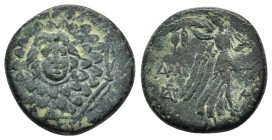 PONTOS.Amisos.(Circa 105-63 BC).Ae.

Obv : Aegis with Gorgon's head at center.
Rev : AΜΙΣΟΥ.
Nike advancing right, holding wreath and palm branch,...
