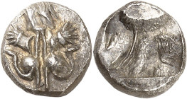 GRÈCE ANTIQUE - GREEK
Espagne, Emporion. Obole ND (Ve s. av. J.-C.), Emporion.
Av. Deux sphinx affrontés, aux têtes en arrière. 
Rv. Motif en creux...