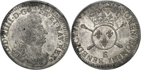 FRANCE / CAPÉTIENS - FRANCE / ROYAL
Louis XIV (1643-1715). Quart d’écu aux insignes 1702, E, Tours.
Av. LVD. XIIII. D. G (soleil) - FR. ET. NAV. REX...