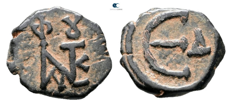 Justin II AD 565-578. Constantinople
Pentanummium Æ

14 mm, 1,73 g



Ver...