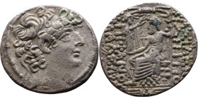 Philip I Philadelphus (93- 83 BC) Tetrarachm Obverse: Head of king right. Reverse: Zeus on throne facing left, holding scepter and Nike, monogram in f...