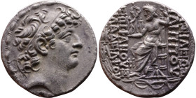Philip I Philadelphus (93- 83 BC) Tetrarachm Obverse: Head of king right. Reverse: Zeus on throne facing left, holding scepter and Nike, monogram in f...