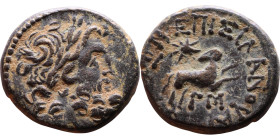 SYRIA. Antioch. Pseudoautonomous (time of Augustus: 27 BC - 14 AD). AE bronze. Obv.: laureate head of Zeus, right. Rev.: ΕΠΙ ΣΙΛΑΝΟΥ ΑΝΤΙΟΧΕΩΝ, ΔΜ (in...