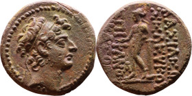 Seleukos VI Epiphanes (96-94 BC) Bronze coin. Obverse: Diademed head of Seleucus VI right, beardless Reverse: Apollo standing left, testing arrow and ...
