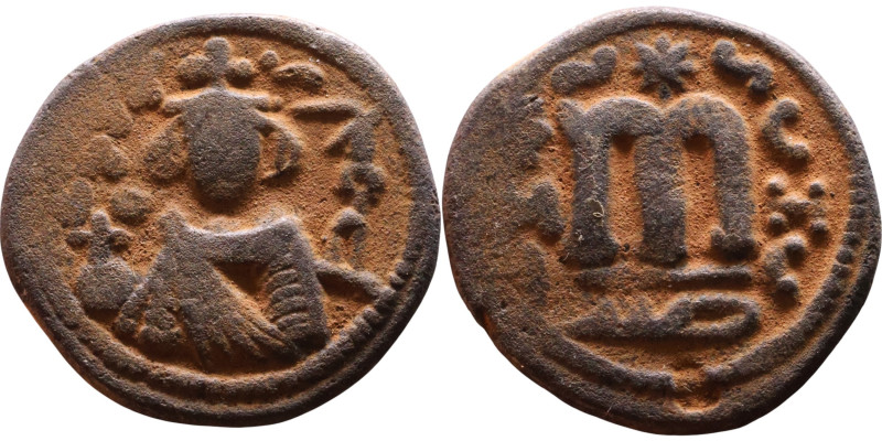 al-Malik ibn Marwan (687-705), Byzantine style folis Obverse: Imperial figure ho...