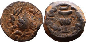 JUDAEA. Jerusalem mint. First Jewish Revolt (66-70 AD). AE prutah. Obv.: Two handled amphora. Rev.: vine leaf on small branch, bears the legend "for t...