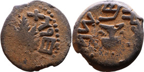 JUDAEA. Jerusalem mint. First Jewish Revolt (66-70 AD). AE prutah. Obv.: Two handled amphora. Rev.: vine leaf on small branch, bears the legend "for t...