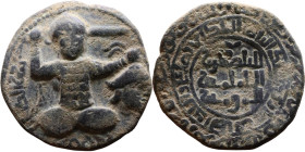 Artuqid State (1102-1409) Bronze coin. Obverse: Male figure seated facing with legs crossed Reverse: Arabic inscription

32mm 14,41g